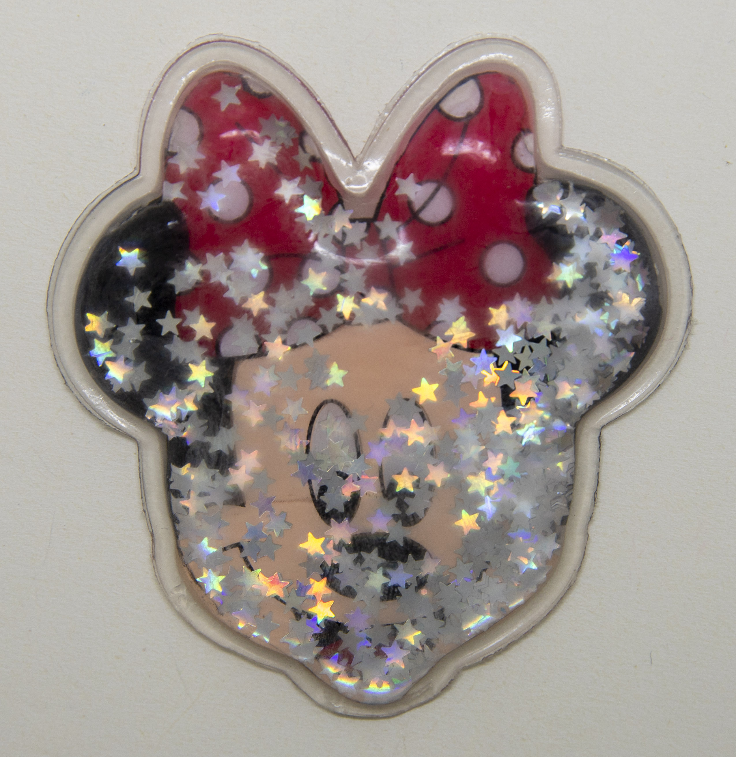 Carita de Minnie con estrellas blancas